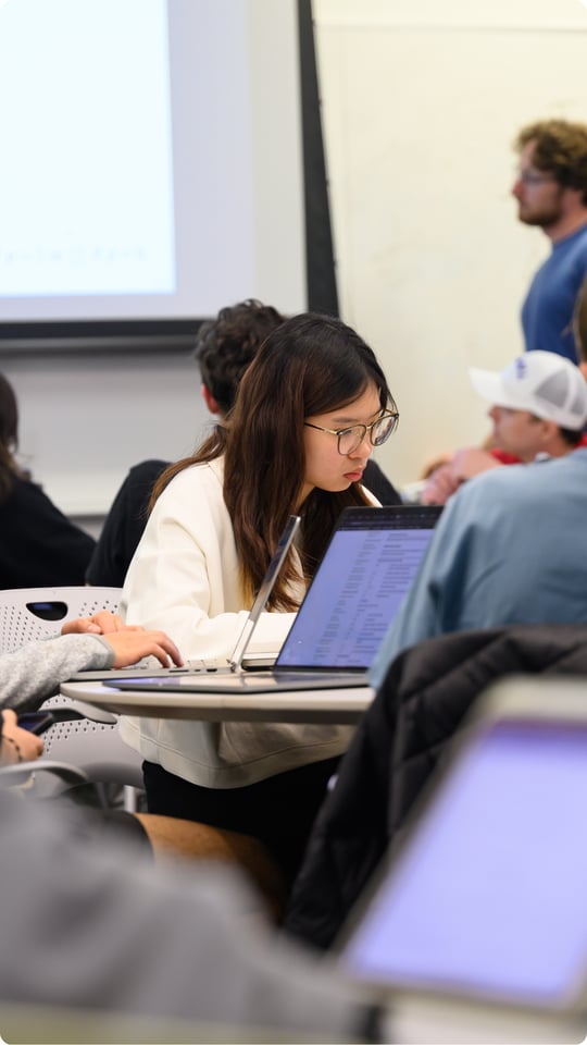 Instructor and students in class